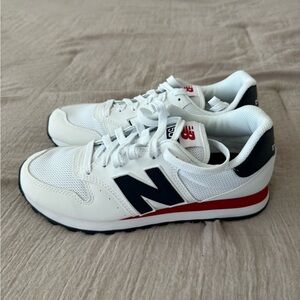 New Balance women’s White and Blue Sneakers